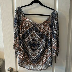 Daniel Rainn off the shoulder top